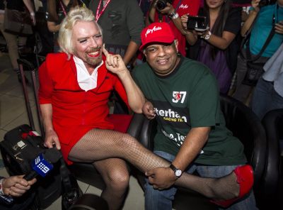 Rt: Tan Sri Tony Fernandes must be pleased that the Government has declared that AirAsia is the "Golden Child".